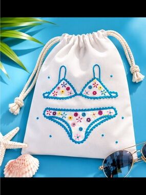 White Bikini Drawstring Bag with Blue and Pink Accents